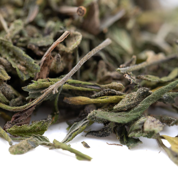 Dried green tea leaves with stems in Daily Grape evening sleep support trim