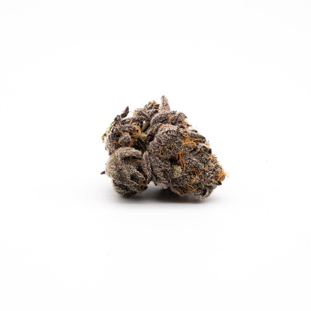 Gas Monkey Indoor THCa Flower: Dark green marijuana bud with resin and trichomes