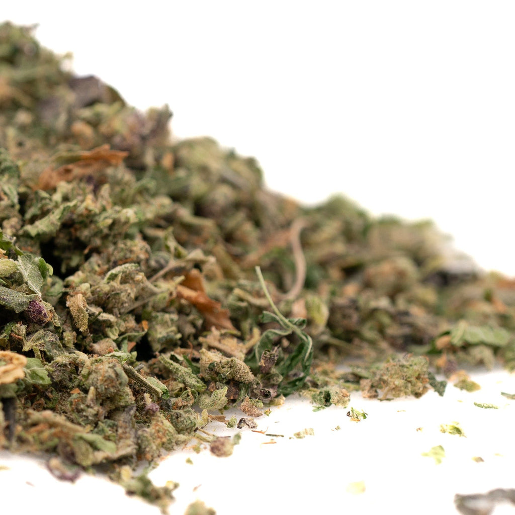 Dried Green Herbs in Northern Lights THCa Indoor Trim for premium quality cannabis