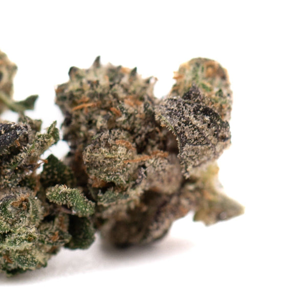 Dense Purple Wedding Cake Indoor Flower Smalls showcasing trichome-rich cannabis buds