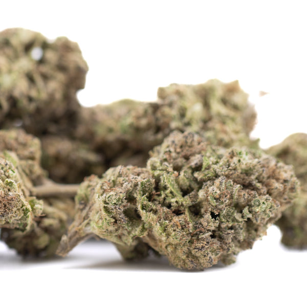 Zkittlez Cross THCa hemp flower bud with dense trichomes and sour tropical citrus tones